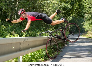 cyclist-falls-off-bike-into-260nw-443827051.jpg